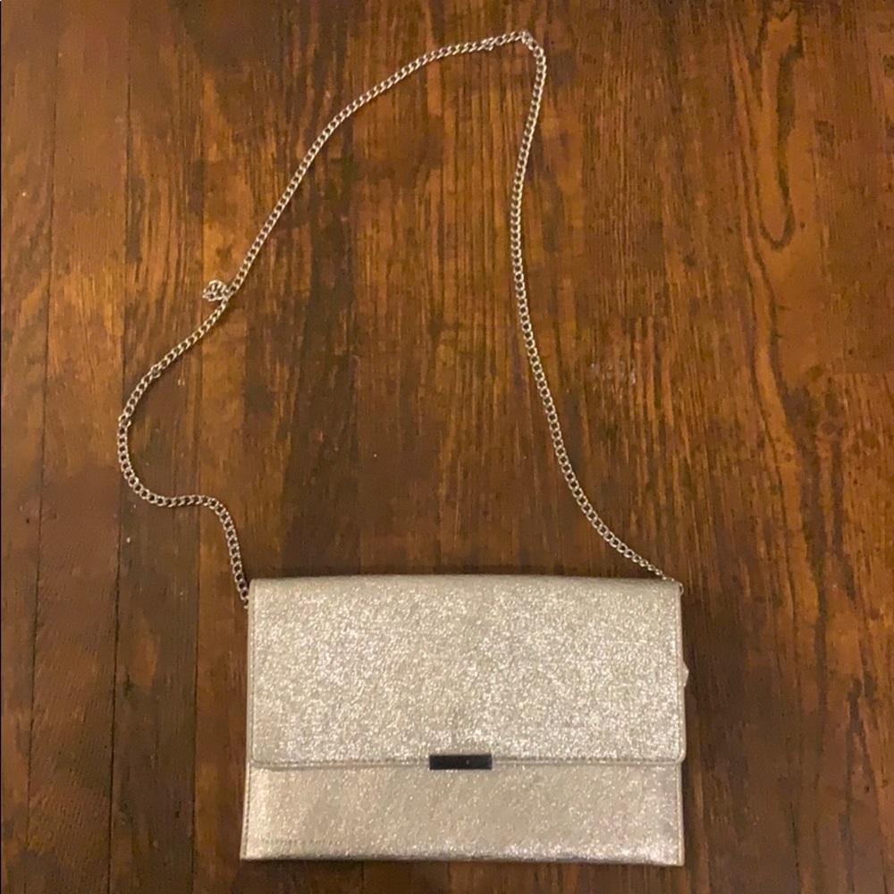USED ONCE- Loeffler Randall Silver clutch